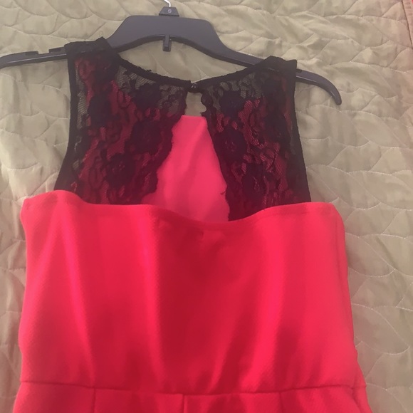 Coral dressy Coral romper with black lace in the back . - Picture 2 of 3
